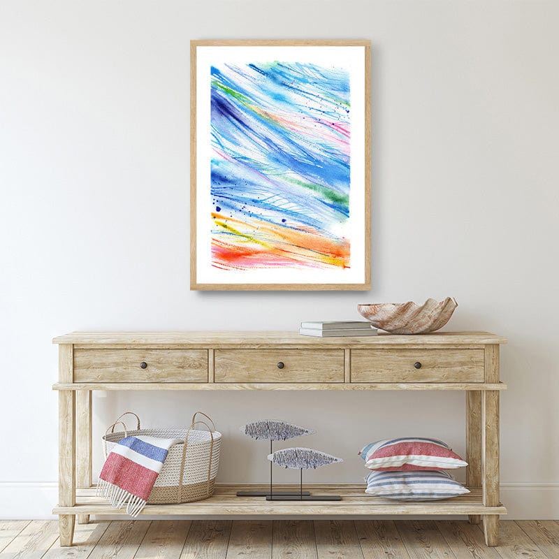 Abstract framed watercolour art print with red and blue brushstrokes in beach house hall way.