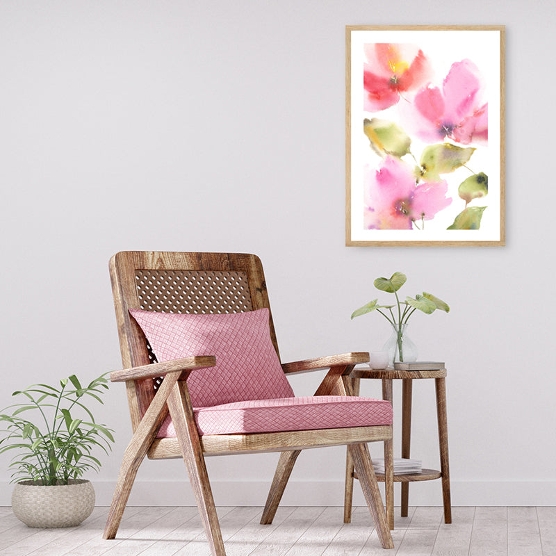 Pink and green abstract floral watercolour framed art print in a minimalist interior.